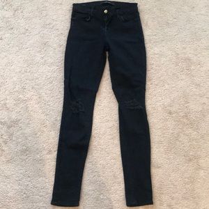 Distressed black J brand skinny high rise